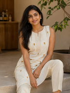 Revanta Cream Straight-Fit Kurta Co-Ord Set with Attached Sleeves, Pintucks and Floral Motifs