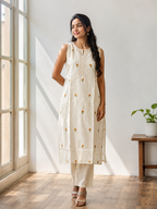 Revanta Cream Straight-Fit Kurta Co-Ord Set with Attached Sleeves, Pintucks and Floral Motifs