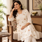 Revanta Cream Straight-Fit Kurta Co-Ord Set with V-Neck Pintucks and Motif Embroidery