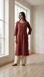 Anvita Rust Maroon Cotton Slub Kurta – Striped Yoke & Bead Accents – Sophisticated Daily Wear