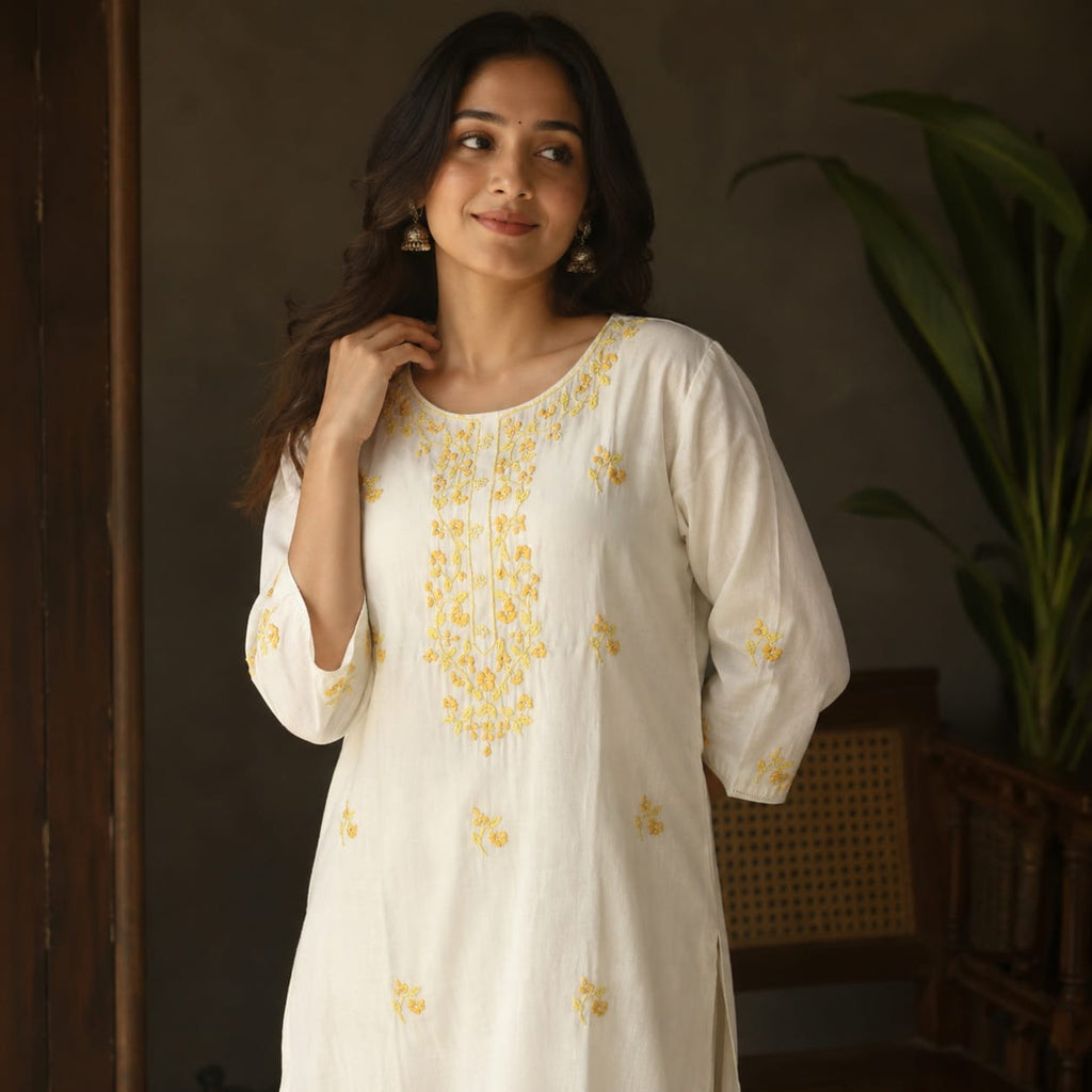 Revanta White Cotton Kurta with Delicate Yellow Floral Embroidery – Elegant Festive Ethnic Wear