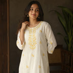 Revanta White Cotton Kurta with Delicate Yellow Floral Embroidery – Elegant Festive Ethnic Wear
