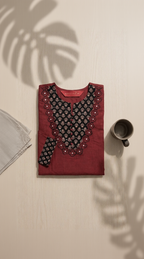 Anvita Rust Red Cotton-Linen Kurta – Black Geometric Embroidery – Elegant Round Neck Daily Wear for Women