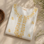 Revanta White Cotton Kurta with Delicate Yellow Floral Embroidery – Elegant Festive Ethnic Wear