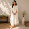 Revanta White Cotton Kurta with Delicate Yellow Floral Embroidery – Elegant Festive Ethnic Wear
