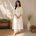 Revanta White Cotton Kurta with Delicate Yellow Floral Embroidery – Elegant Festive Ethnic Wear